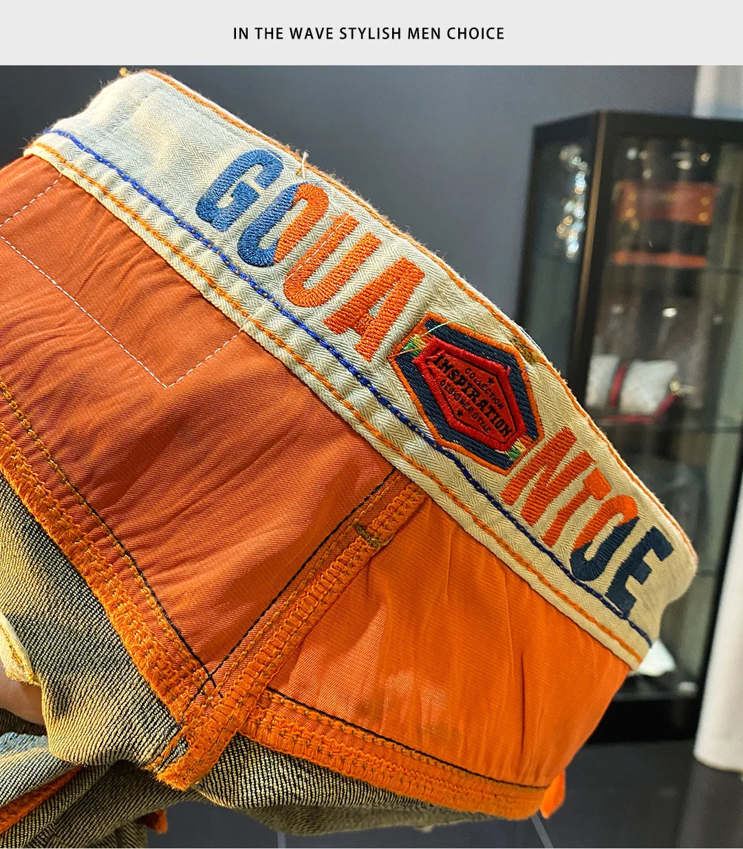 MXKSKV Men’s Slim Fit Straight-Leg Jeans. Distressed Stonewashed Denim with Badge Detail