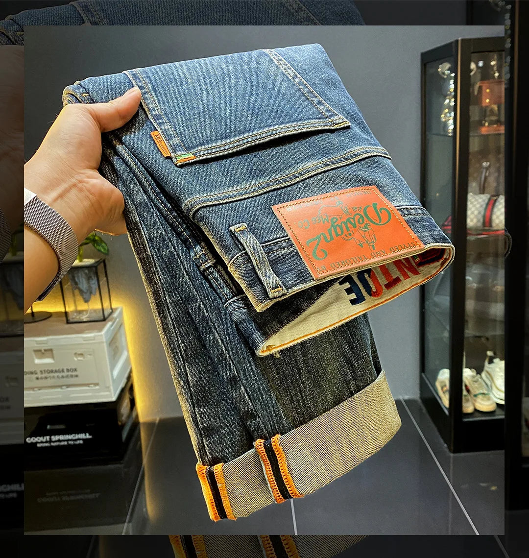 MXKSKV Men’s Slim Fit Straight-Leg Jeans. Distressed Stonewashed Denim with Badge Detail